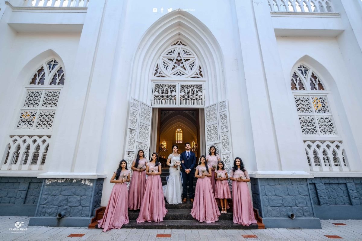 Brides And Groom Mads Infront Of The Church 